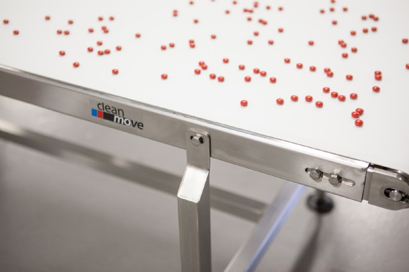Stainless steel conveyor carrying pills